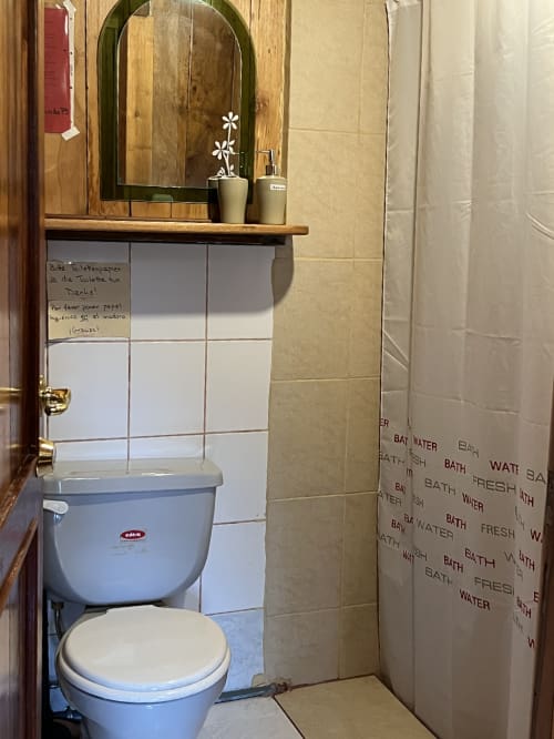 Guest rooms at Mindo Lindo include a private bathroom with shower