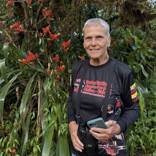 Heike Brieschke, FEVE Secretary, in her element, outdoors with binoculars and cellphone for registering birds