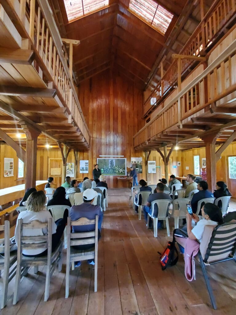 Community members attend a workshop at the Mindo Lindo Environmental Center